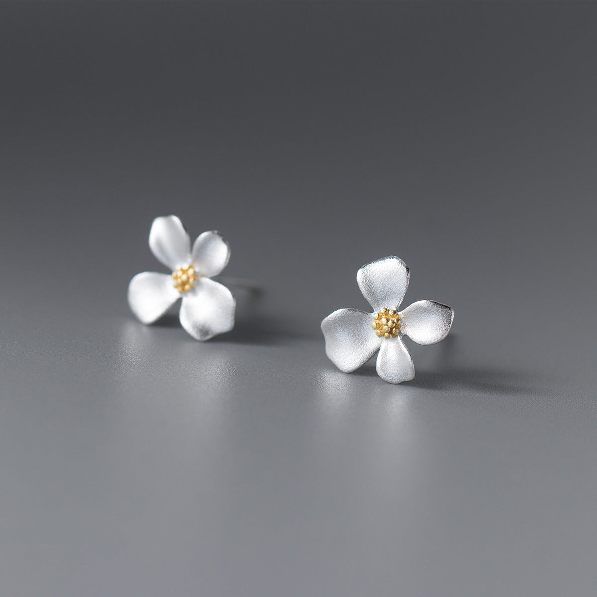 Aretes Flor Radiante