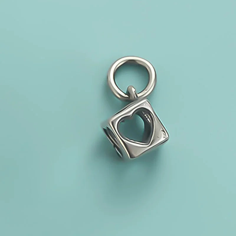 Dije Corazón Calado con Brillos