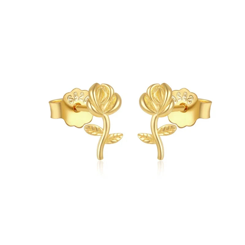 Aretes Estrella y Flor con Zirconias