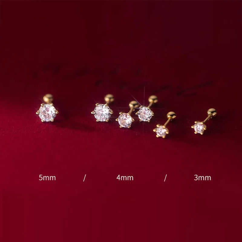 Aretes Punto de Luz de Seis Garras