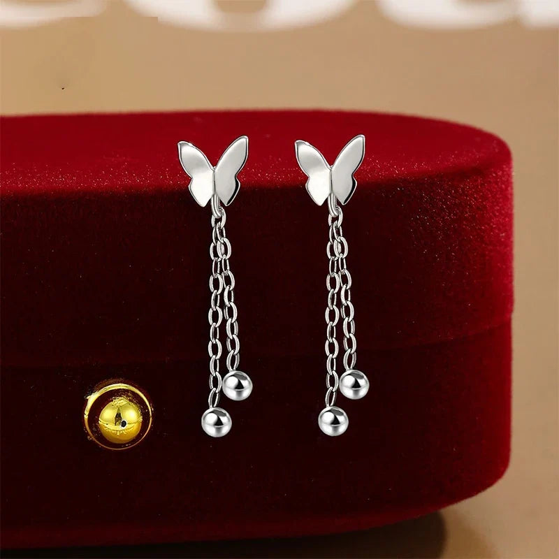 Aretes Mariposa con Borla