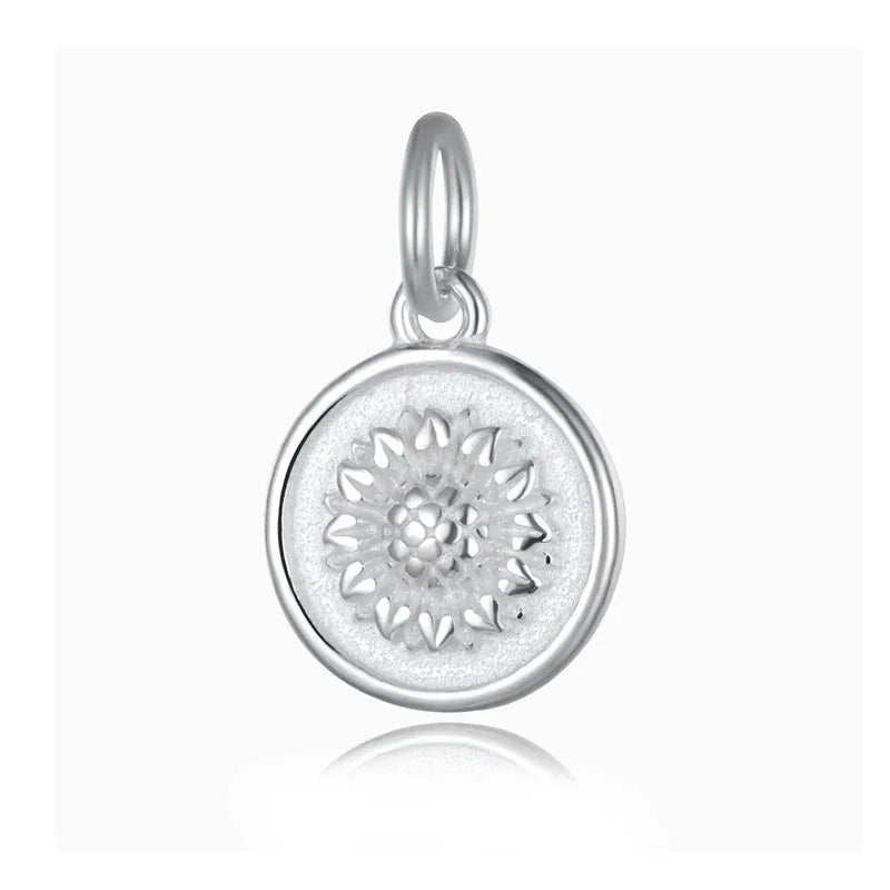 Dije Moneda con Girasol