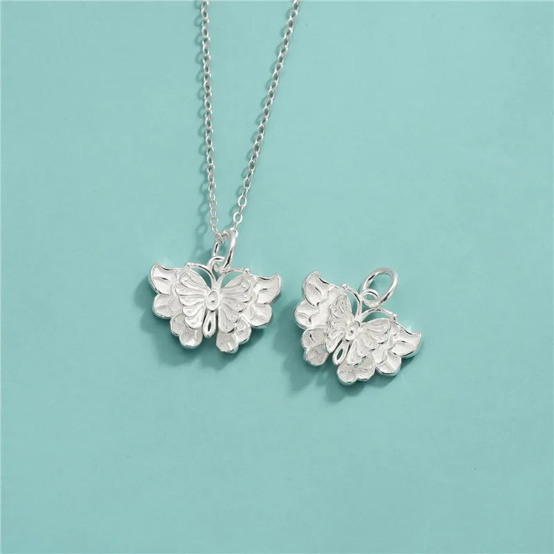 Dije Mariposa Blanca o Negra