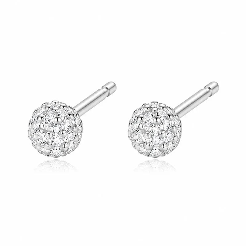 Aretes Moño o Círculo con Zirconias
