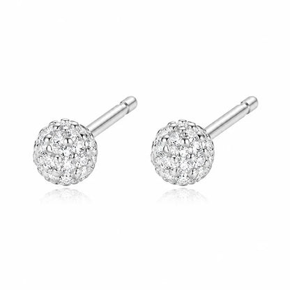 Aretes Moño o Círculo con Zirconias