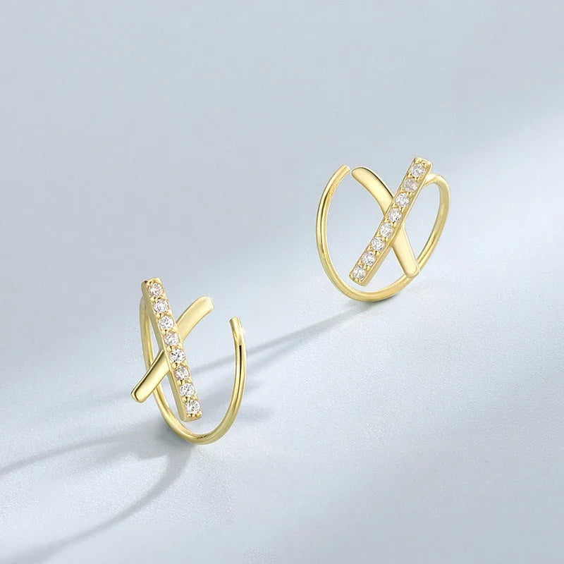 Aretes Cruz en X con Zirconias