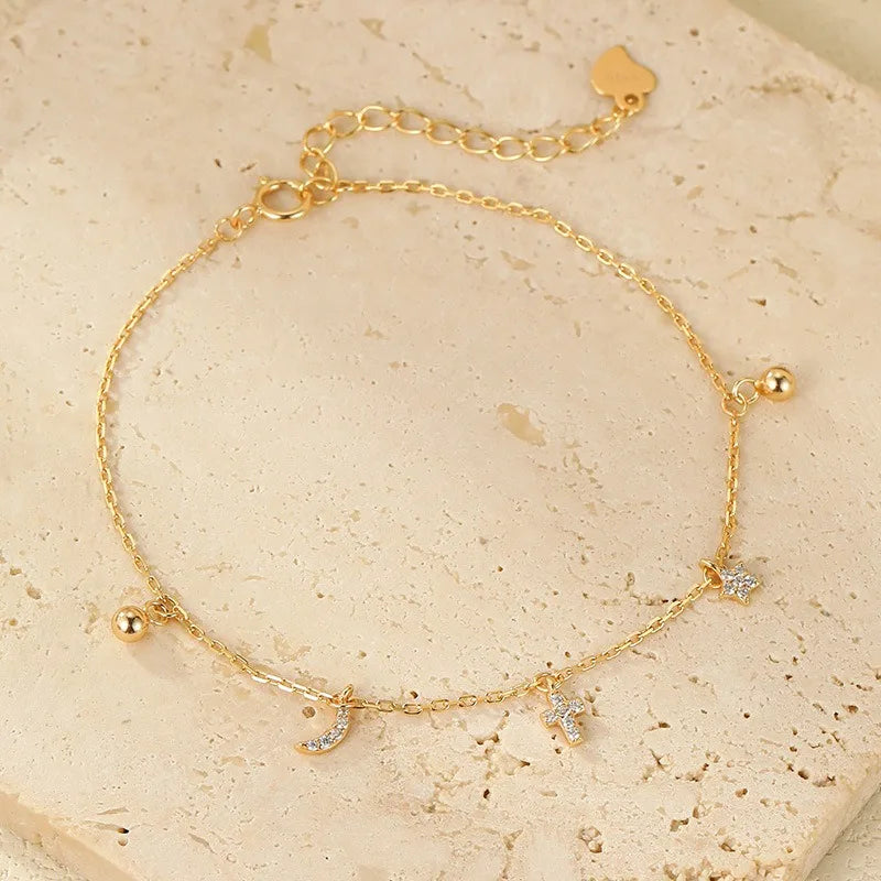 Pulsera Estrella, Luna y Cruz con Zirconias
