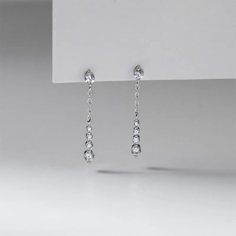Aretes con Flecos y Zirconias