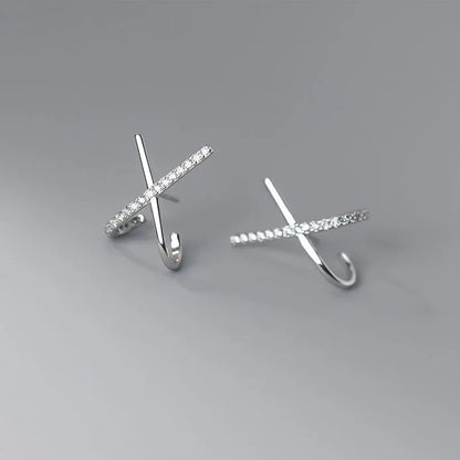 Aretes Cruz Delicada con Zirconias