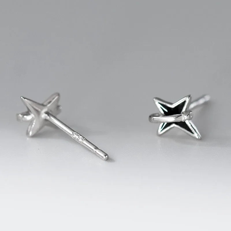 Aretes Estrella Negra de Cuatro Puntas