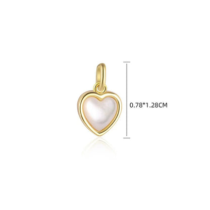 Dije Corazón de Concha Blanca