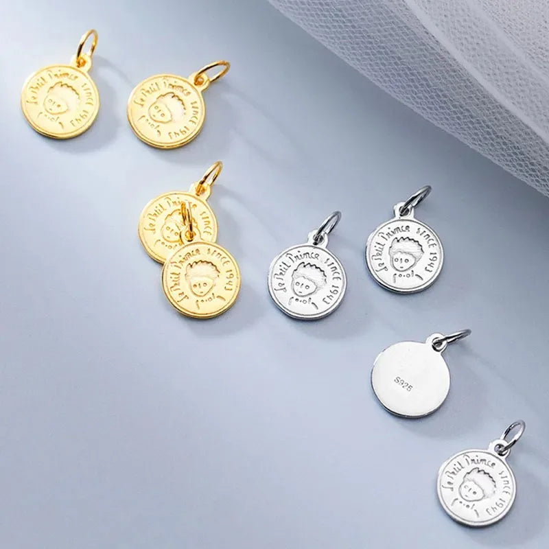 Dije Moneda con Niño