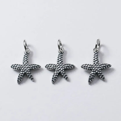 Dije Estrella de Mar Plateada o Envejecida
