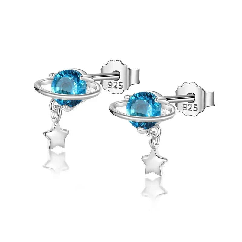 Aretes Planeta y Estrella con Zirconia Negra