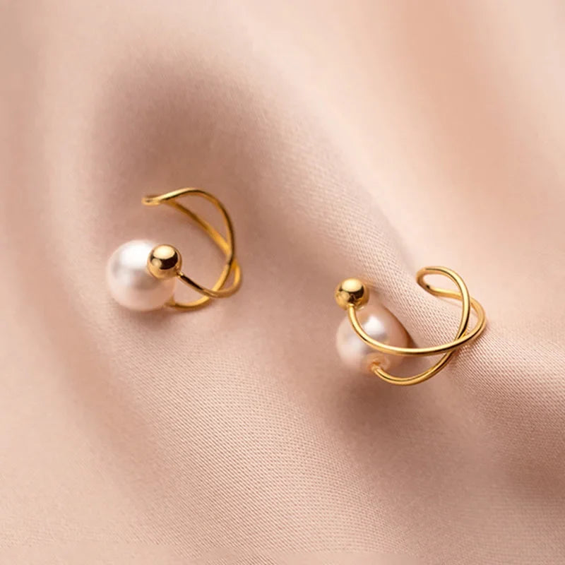 Aretes de Clip Cruz con Perla