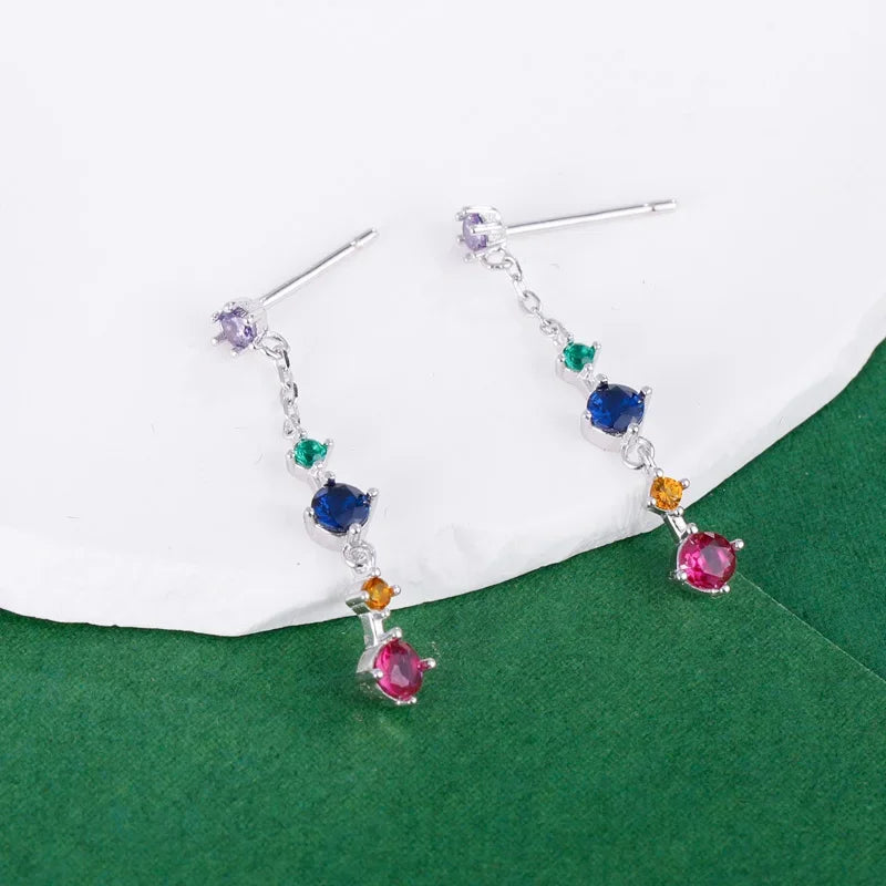 Aretes Largos con Flecos