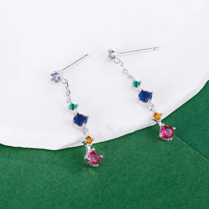 Aretes Largos con Flecos