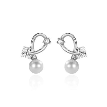 Aretes Cruz con Perla y Zirconia Cuadrada