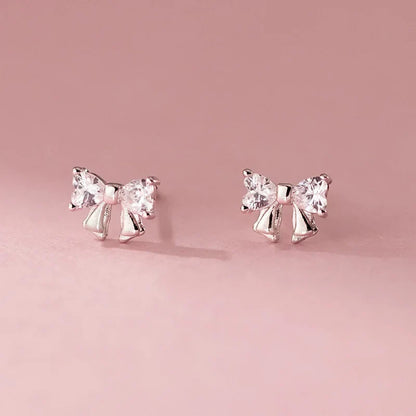 Aretes Moño con Zirconias Blancas o Rosas