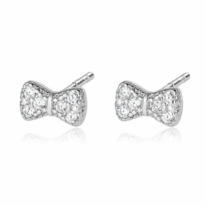 Aretes Moño o Círculo con Zirconias