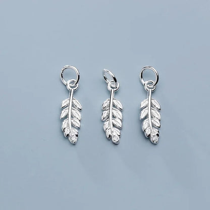 Dije Pluma con Zirconias