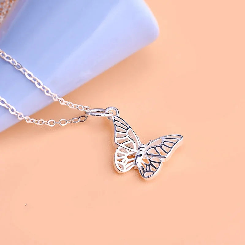 Dije Mariposa Calada