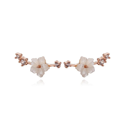 Aretes Flor de Concha con Zirconias