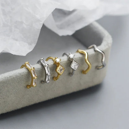Aretes de Clip Curvos con Zirconias