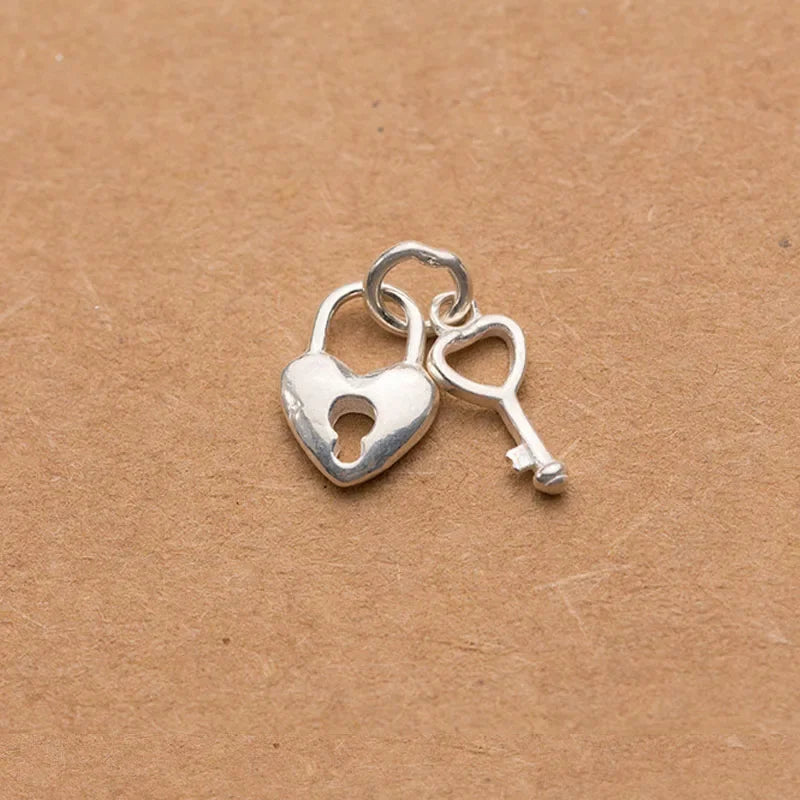 Dije Llave con Corazón en Cuatro Estilos