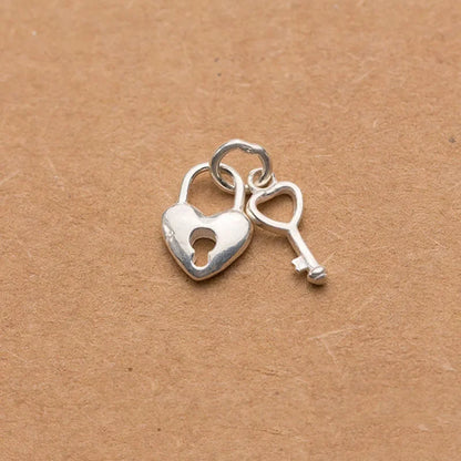 Dije Llave con Corazón en Cuatro Estilos