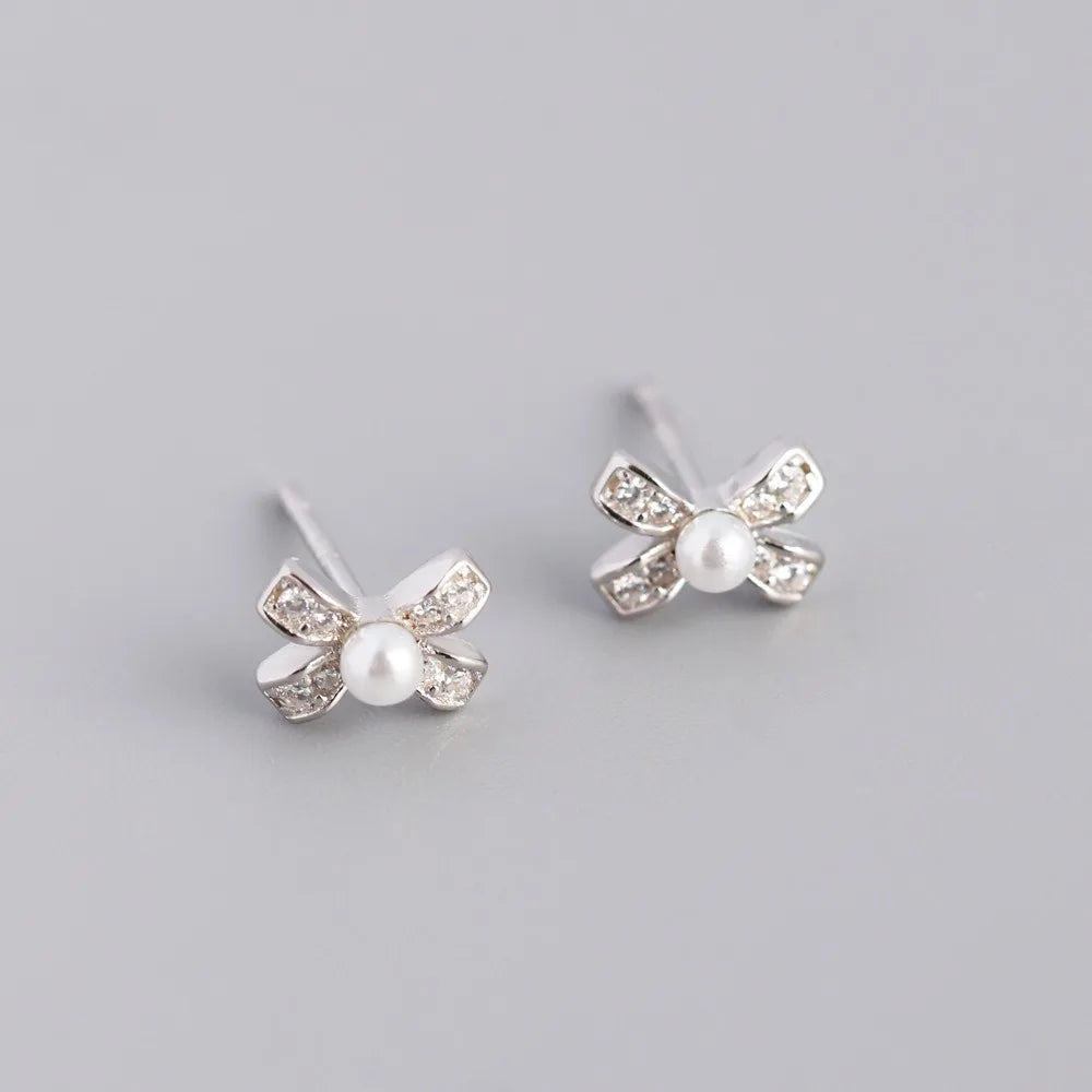 Aretes Moño