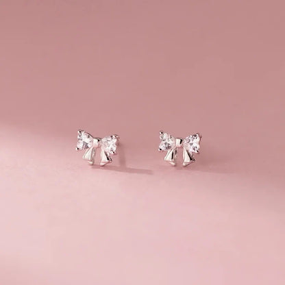 Aretes Moño con Zirconias Blancas o Rosas