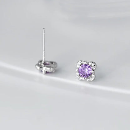 Aretes Flor con Zirconias Moradas