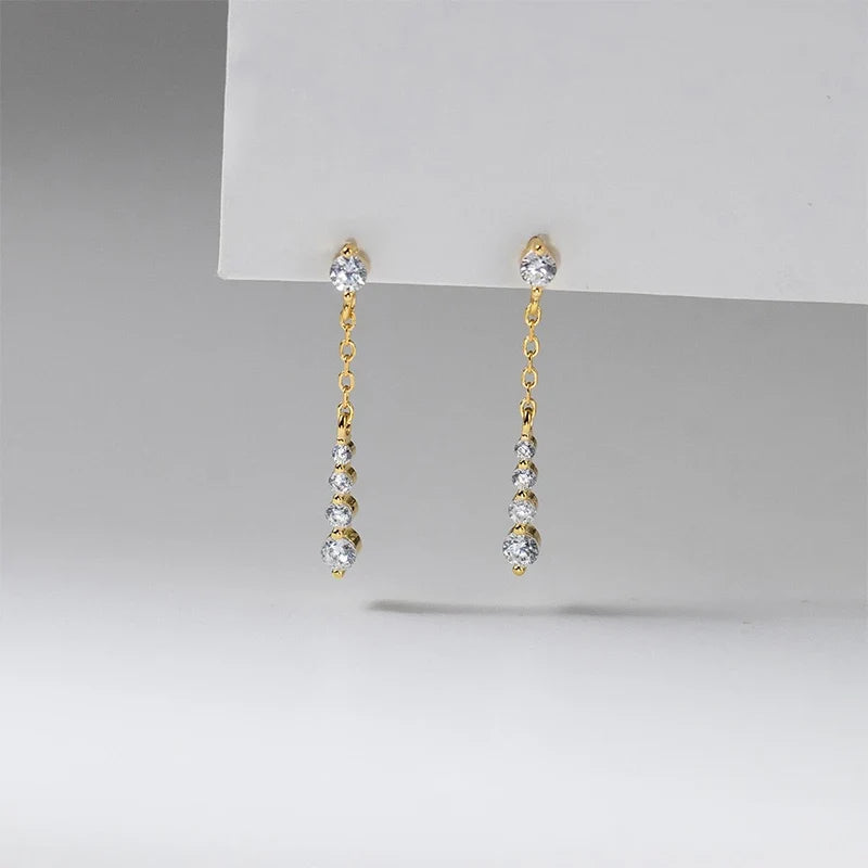 Aretes con Flecos y Zirconias