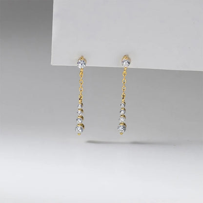 Aretes con Flecos y Zirconias