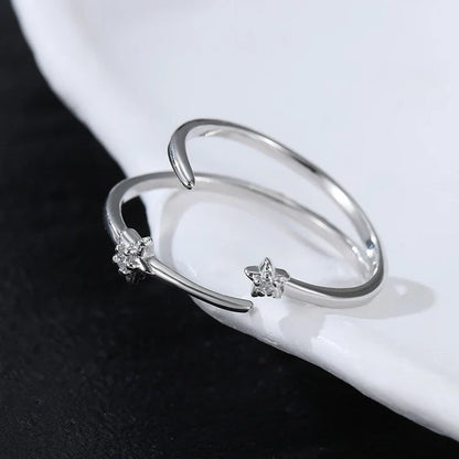 Anillo Doble Estrella Ajustable