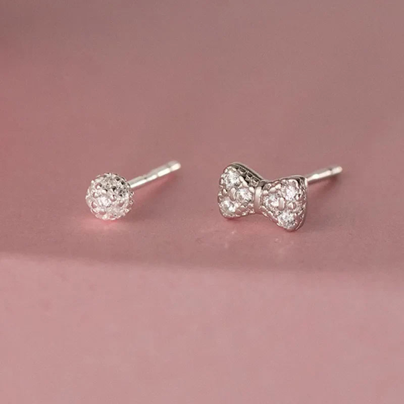 Aretes Moño o Círculo con Zirconias