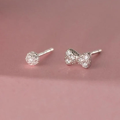 Aretes Moño o Círculo con Zirconias