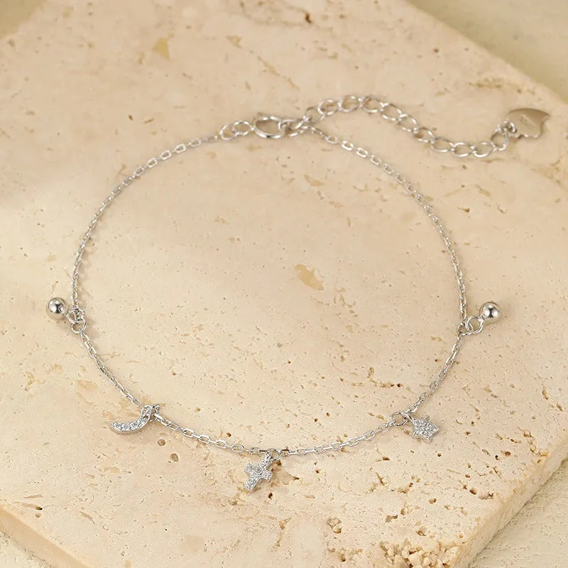 Pulsera Estrella, Luna y Cruz con Zirconias