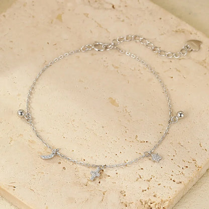 Pulsera Estrella, Luna y Cruz con Zirconias
