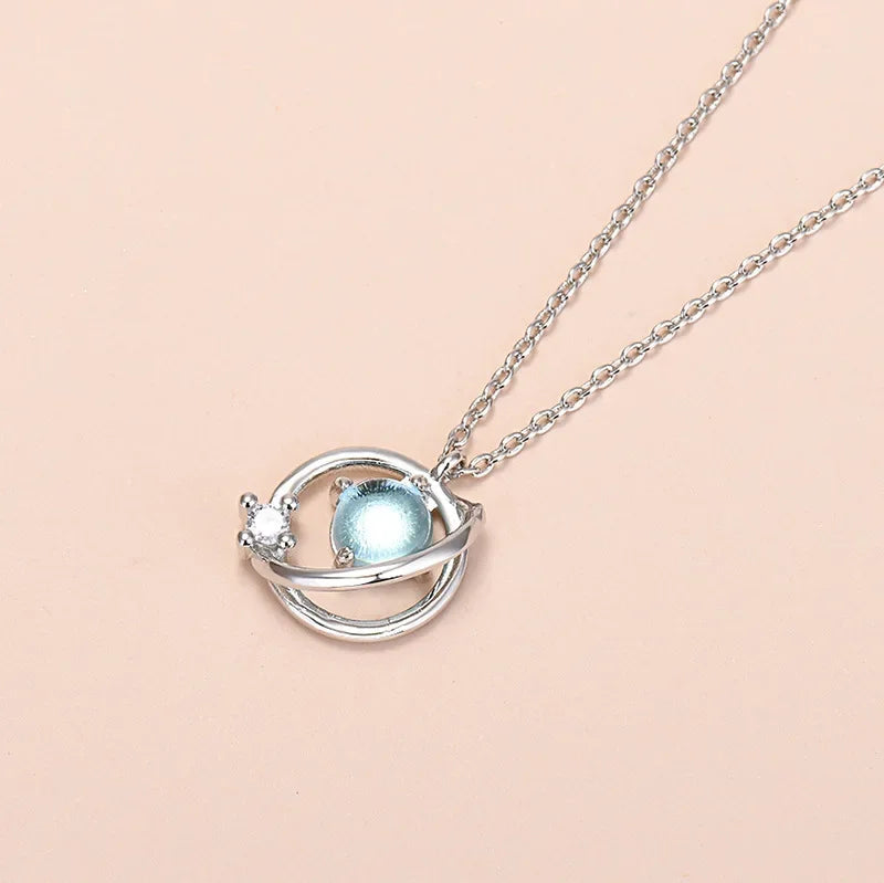 Anillo, Collar o Aretes de Cristal Azul