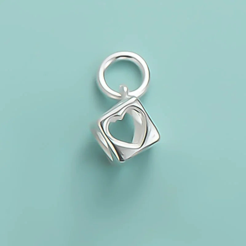 Dije Corazón Calado con Brillos