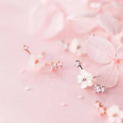 Aretes Flor de Concha con Zirconias
