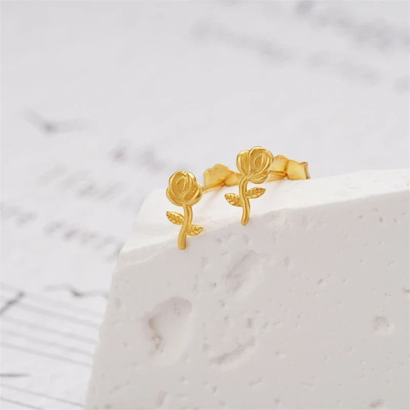 Aretes Estrella y Flor con Zirconias