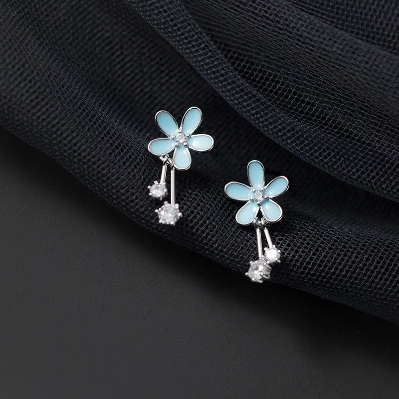 Aretes Flor Esmaltada Azul con Zirconias