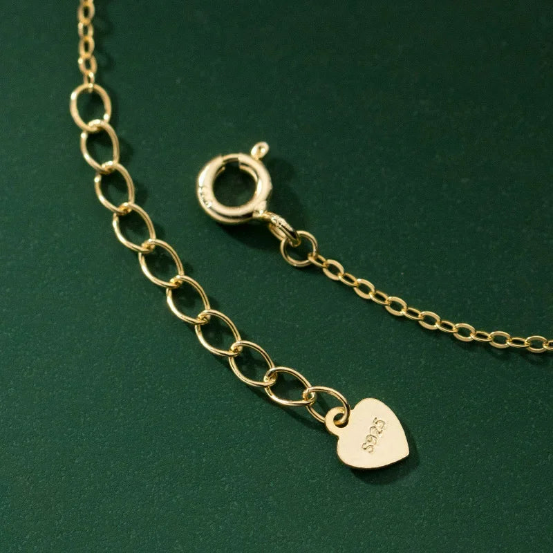 Pulsera Cadena Fina con Corazón y Cruz