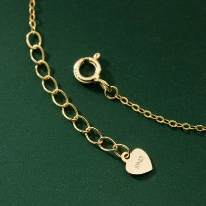 Pulsera Cadena Fina con Corazón y Cruz