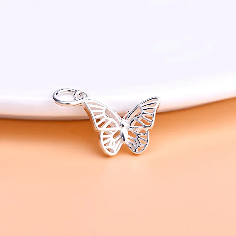 Dije Mariposa Calada