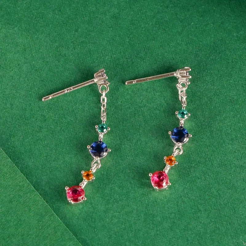 Aretes Largos con Flecos