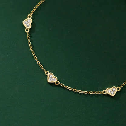 Pulsera Cadena Fina con Corazón y Cruz
